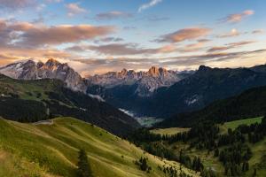 a view of South Tyrol in Italy with it's rolling hills and mountains in the background