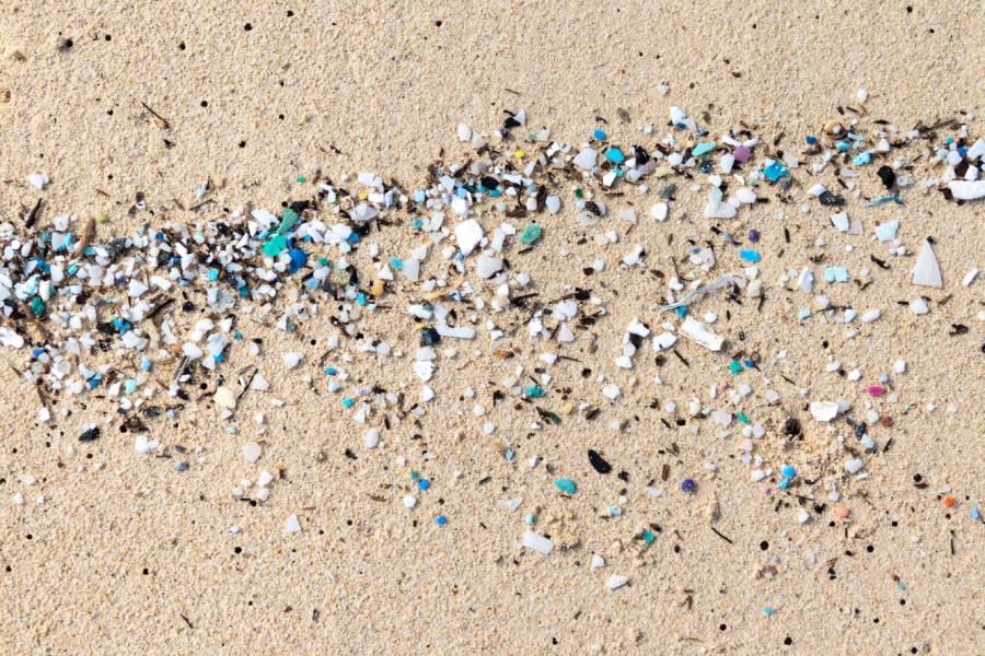 Close up image of microplastics on a beach