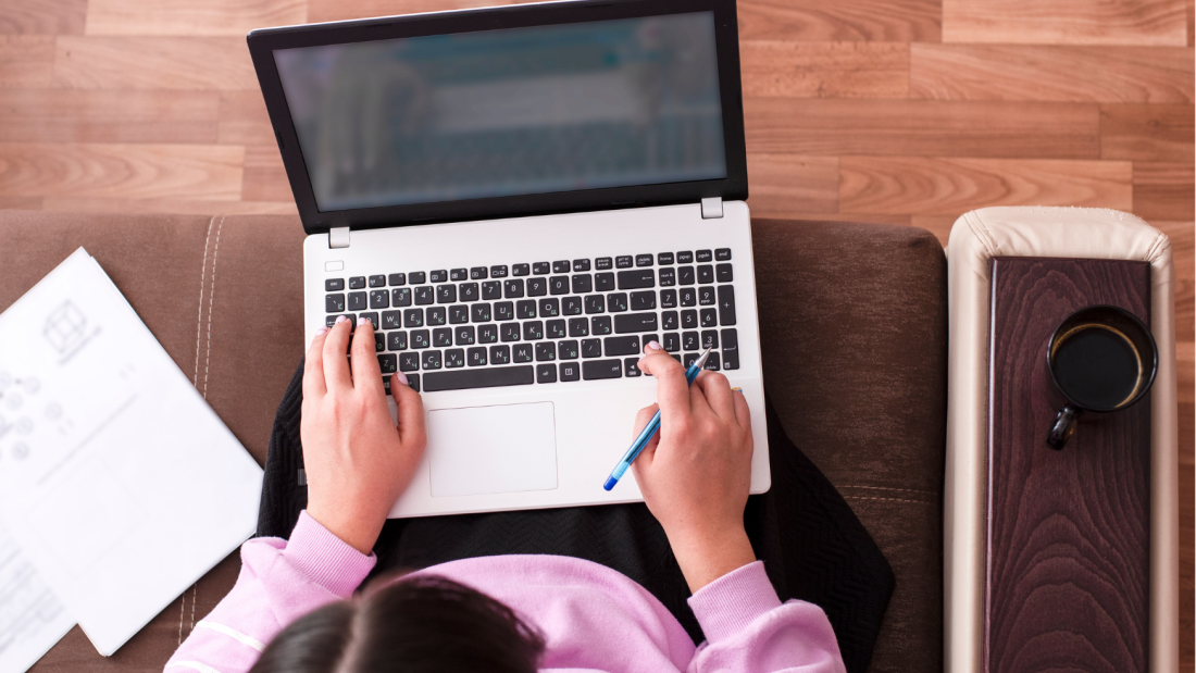 student working on a laptop