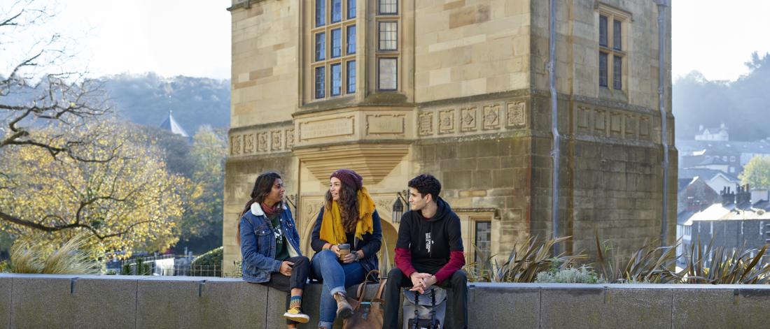 Students socialising outside Pontio