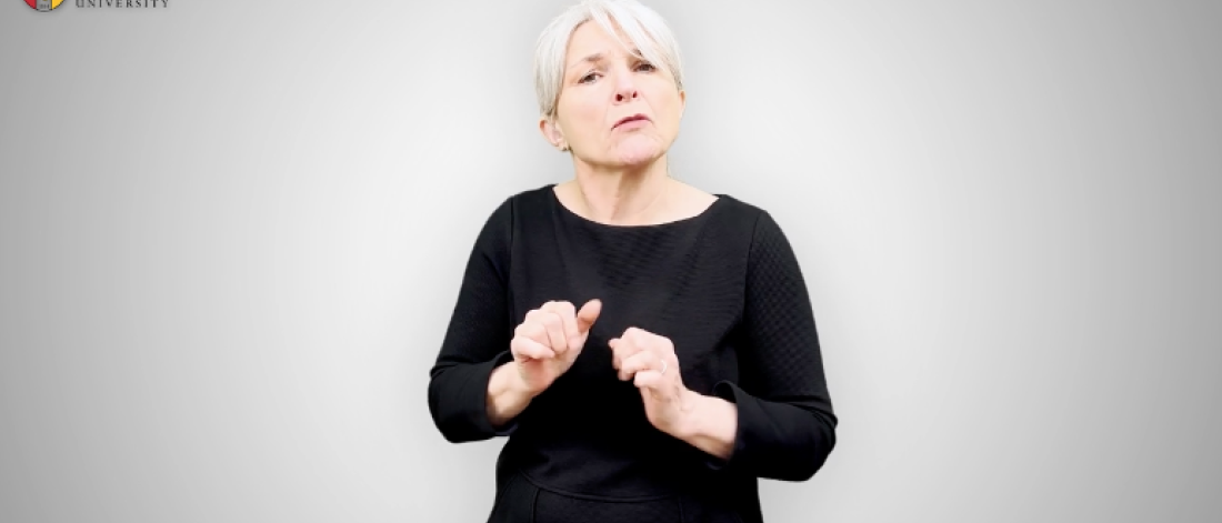 Image of a person doing sign language