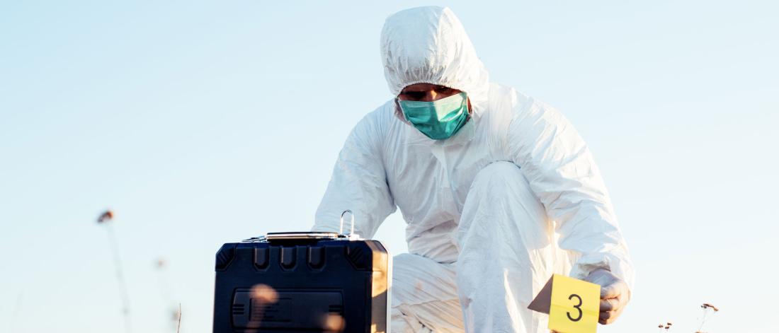 Forensic Scientist taking samples