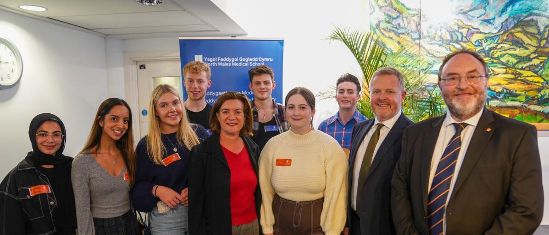 First Minister Eluned Morgan with Jeremy Miles MS, the Vice-Chancellor and medical students at the launch of the North Wales Medical School