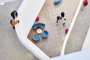 Students inside Pontio, Bangor's Arts and Innovation Centre