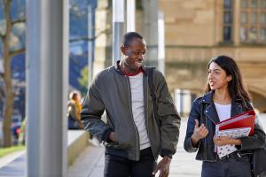 A couple of students walking between lectures