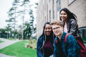 Students socialising outside the halls of residence at St Mary's Student Village