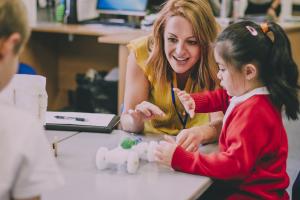 Teacher in a primary classroom.