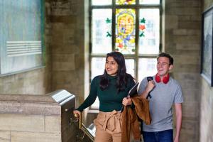 Students coming up stairs in Main Arts building