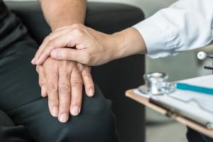 Nurse giving patient support