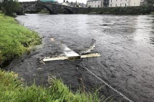 A net is used to collect microplastics within the Conwy river