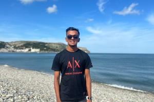 Image of International Student Mentor - Minhajul on the beach