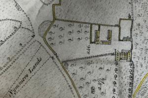 Extract from an historic map showing a country house and outbuildings.