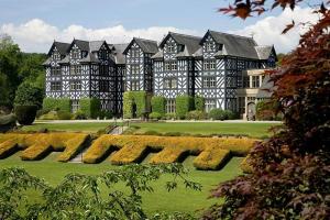 Photograph of Gregynog Hall, a black and white mansion