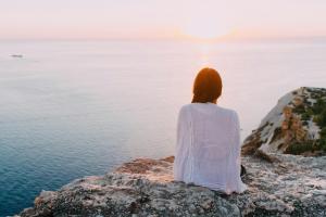 Woman looking towards the sea