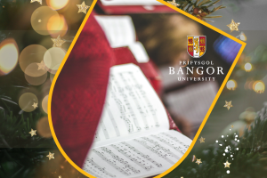 Photo of a music score and Christmas lightings