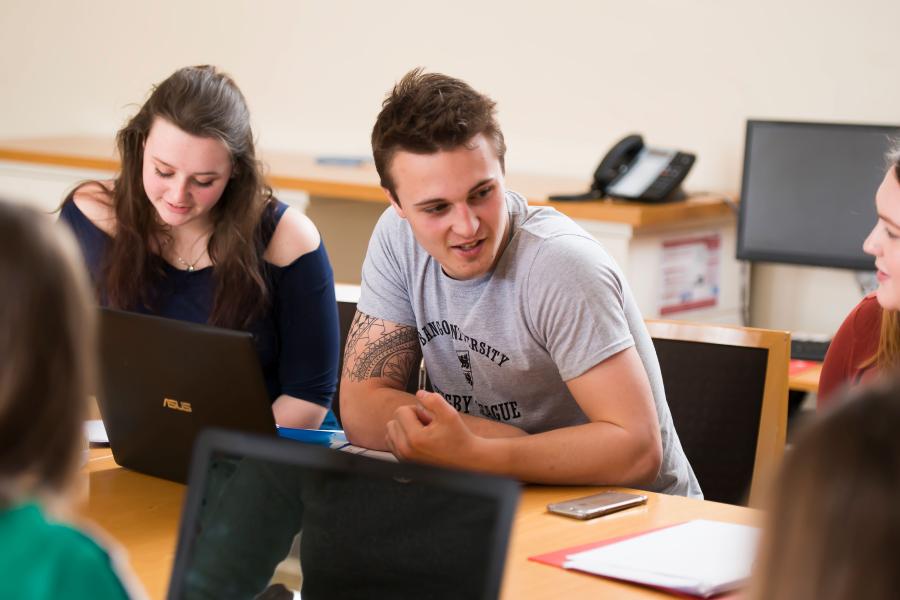 Students talking during a seminar