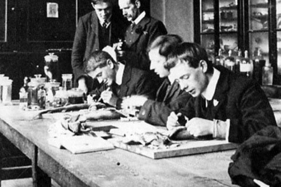 Old photo of students working in the laboratory, Bangor University