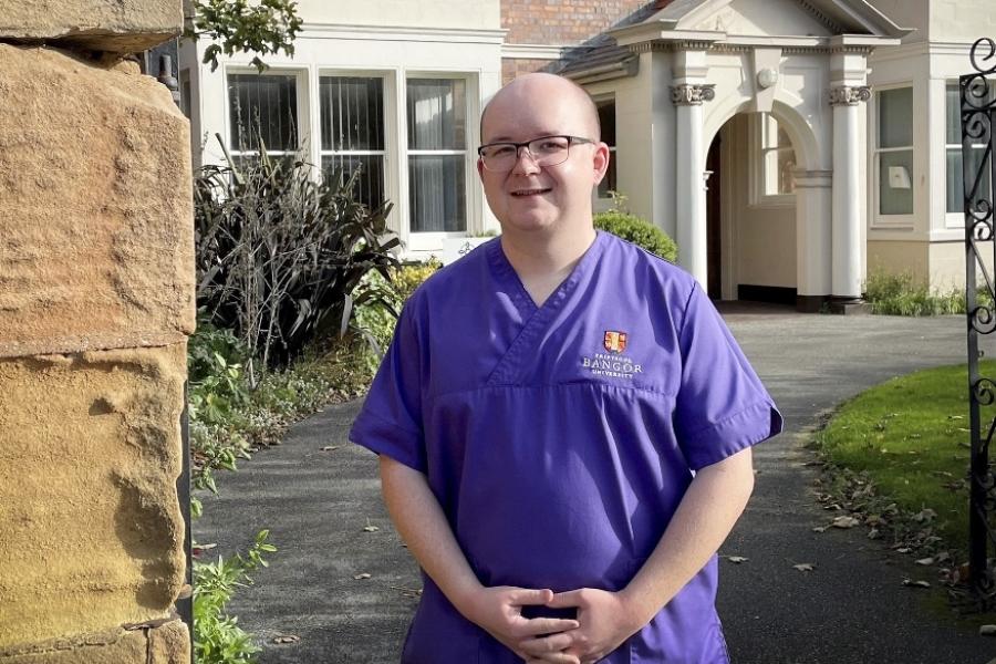 Daniel Flower in nursing uniform