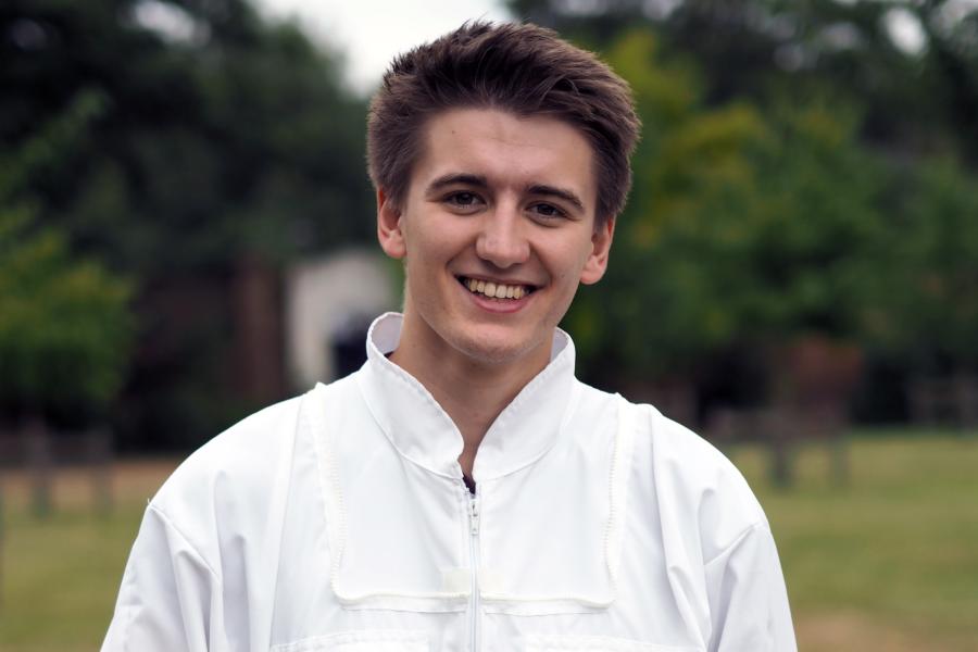 A young man in a white top