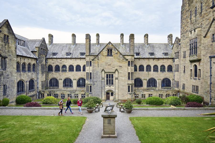 Main Arts inner quad with people walking across