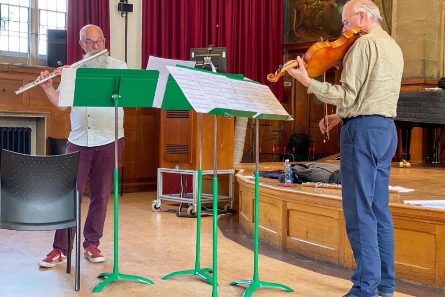 flautist and violist playing their instruments