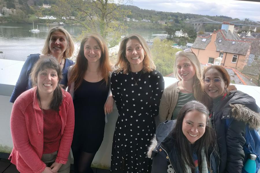 Group of happy smiling ladies having attended and interesting talk