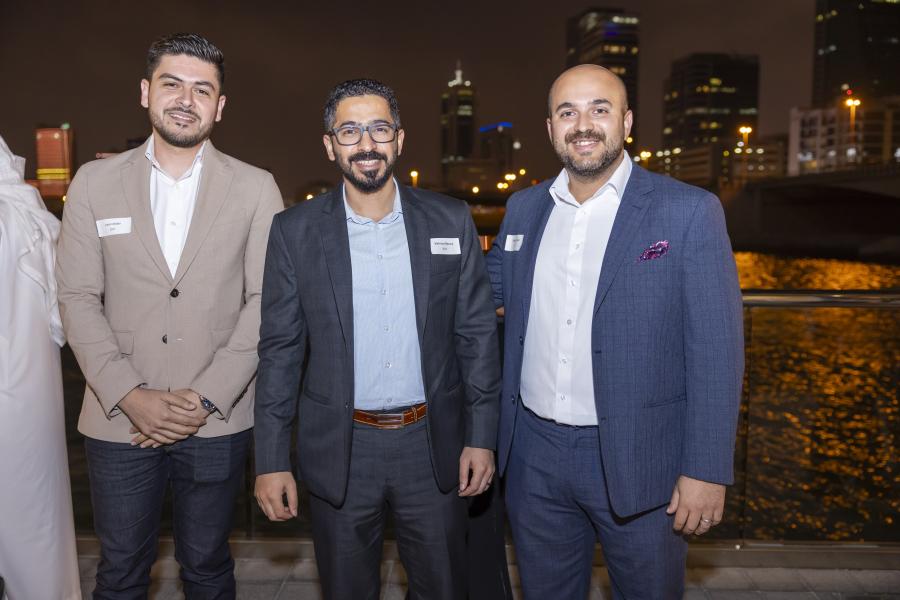 Three alumni at the Bahrain reunion