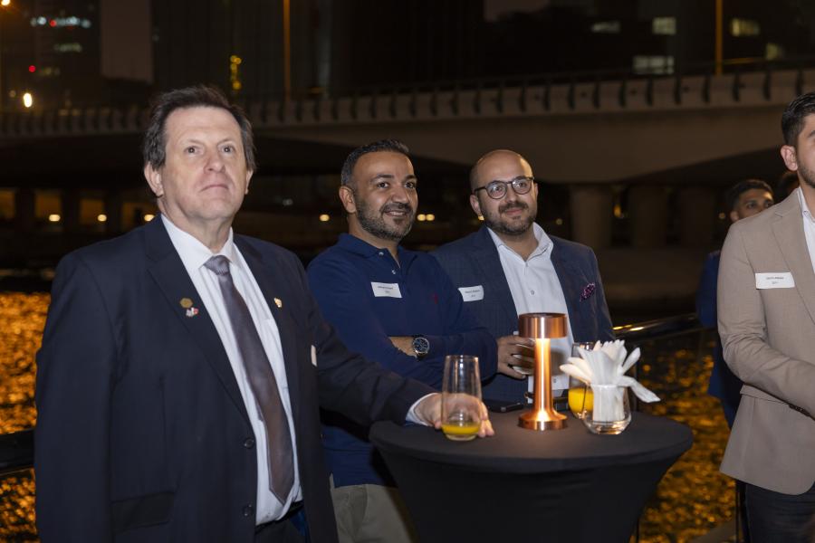 Alumni listening to speeches at Bahrain reunion