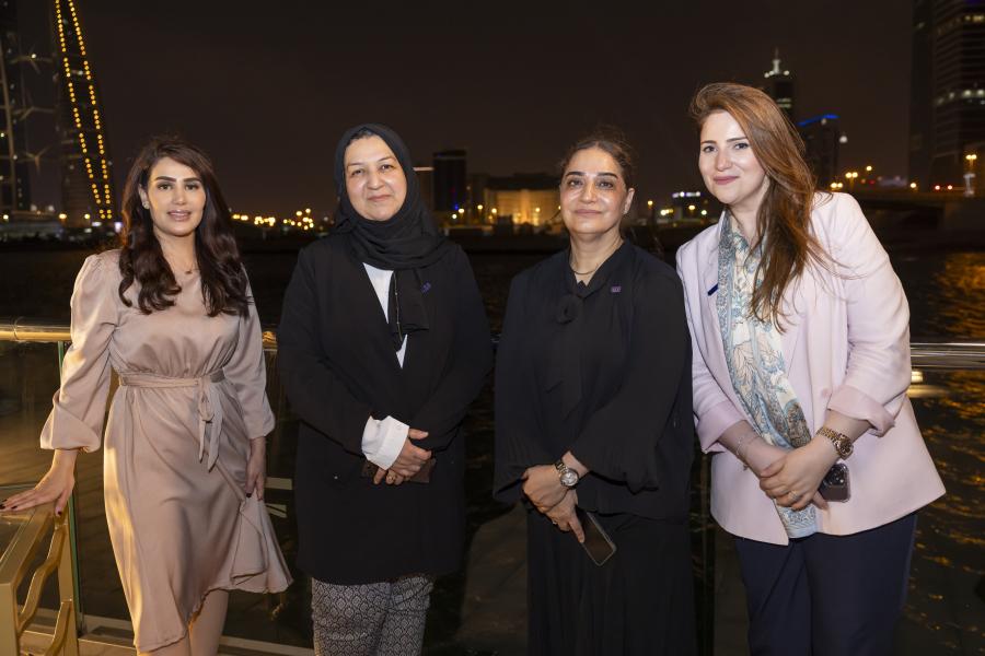 Four alumni at Bahrain reunion
