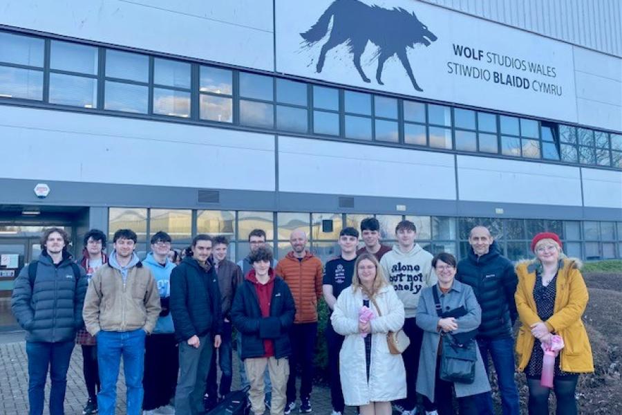 Students standing outside a tv studio