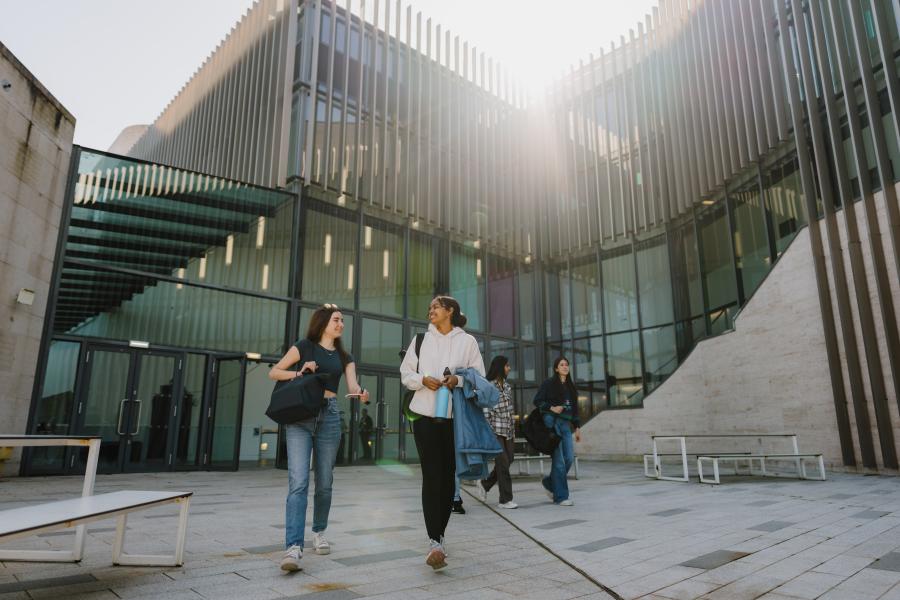 A photo of students walking outside of Pontio's second floor door.