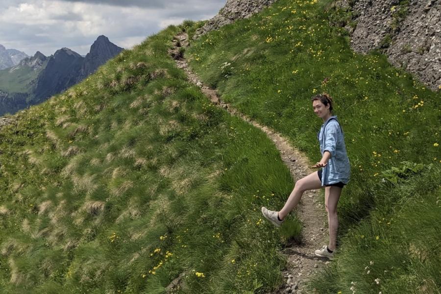 Researcher standing on hillside