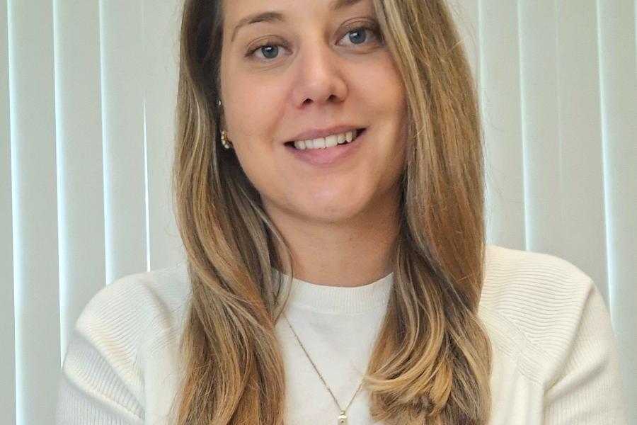 a selfie of Dr Alyson Moyes a female lecturer who has long brown hair