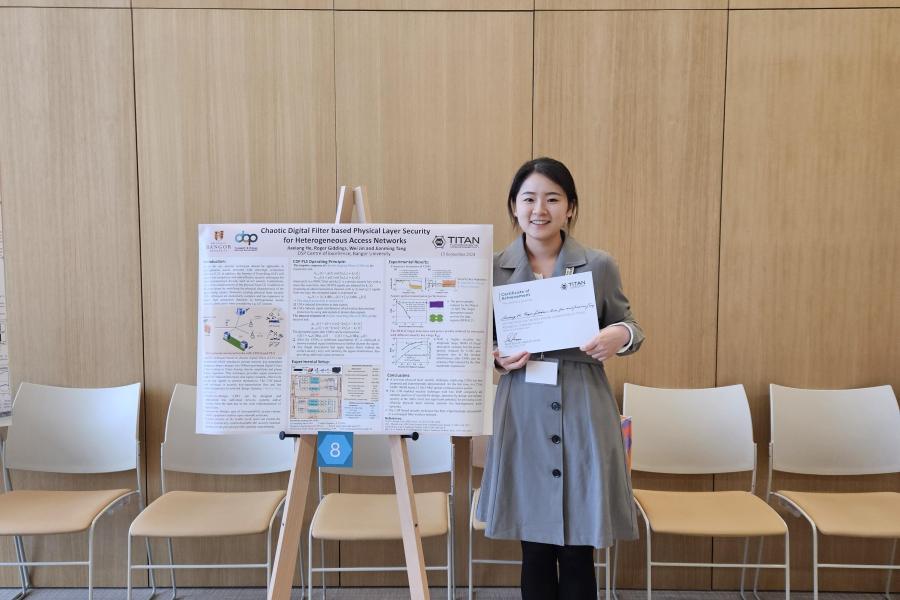 Jiaxiang at the TITAN project community event with her research poster on display