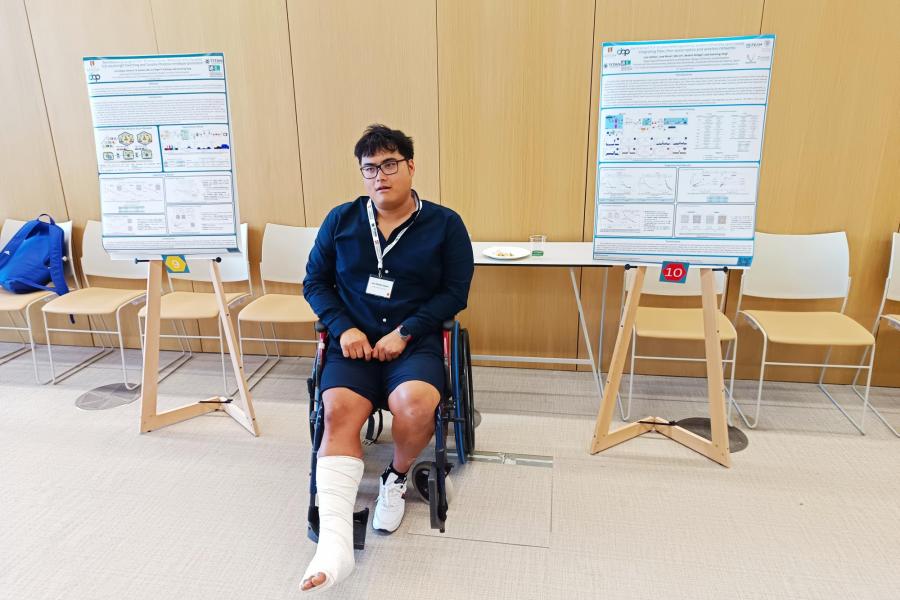 Luis at the TITAN project community event with both his research posters on display