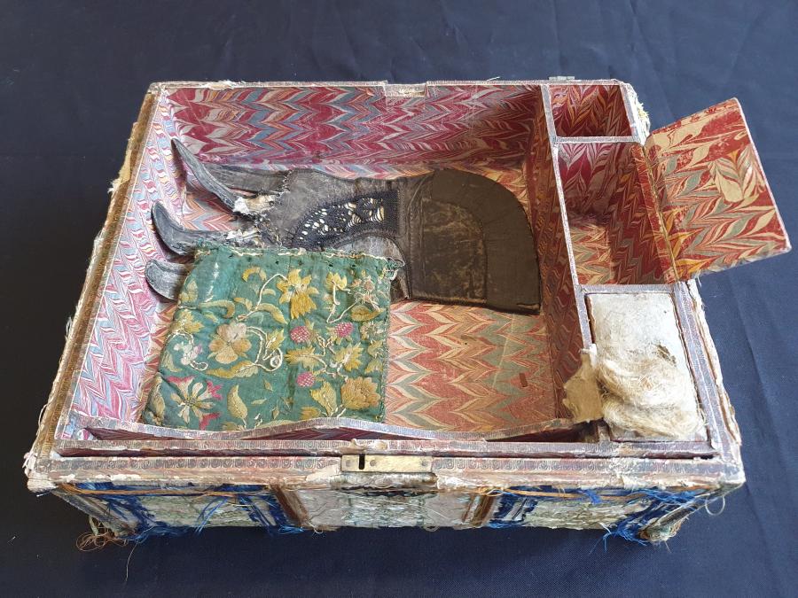 ornately decorated stump-work box open