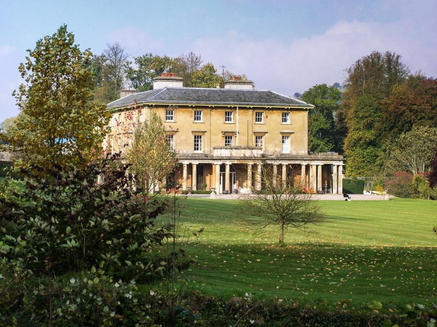 Photograph of Penpont, a Georgian house with a colonnade to its principal facade.