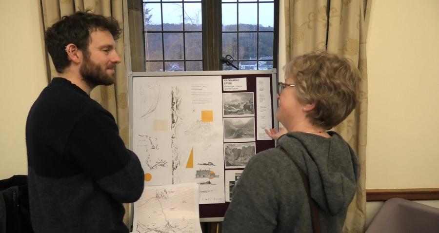 ISWE Doctoral Students Alex Ioannou and Hannah Jones discuss Alex's display at ISWE's Community Day